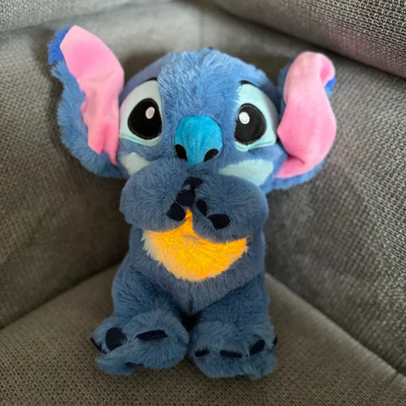 Peluche que respira Stitch con canción de cuna relajante